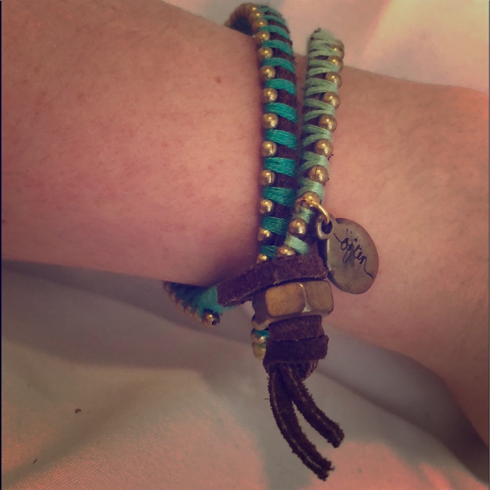 Rope bracelet with “wander often” charm